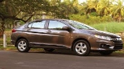 Mua Honda City mới hay Toyota Corolla cũ?