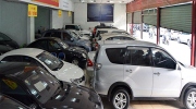 Đại gia ôtô lỗ nặng: Đóng showroom, đi bán nước ngọt, quần áo